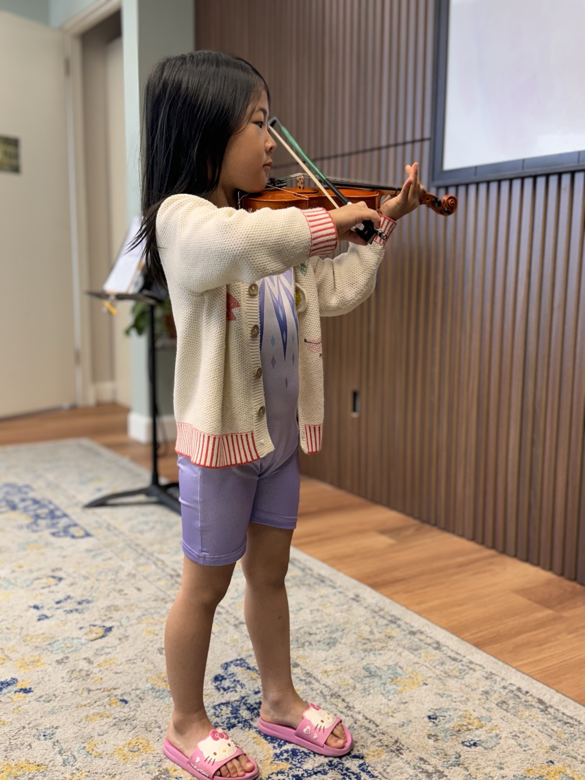Young student playing the violin